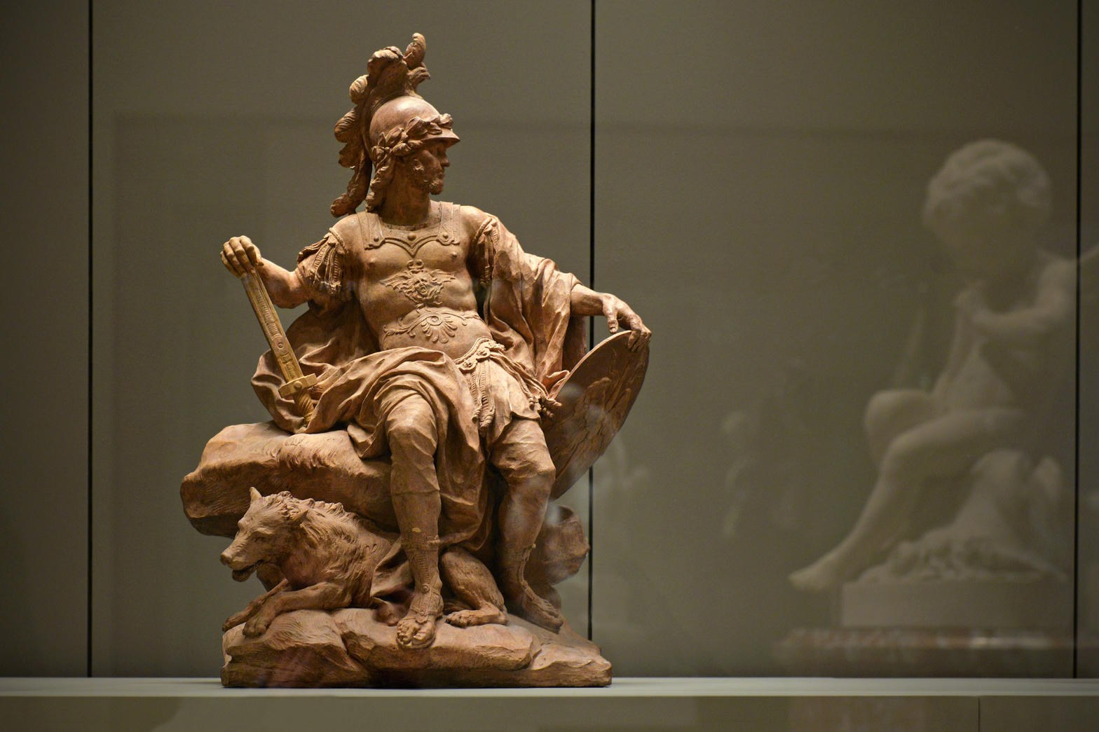 Terracotta Mars with helmet, sword, shield, and wolf companion